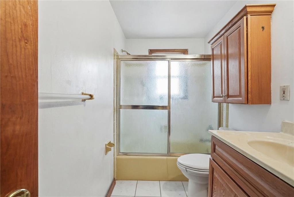51 Revo Road Pittsburgh, PA 15236 - Photo 20 of 29 a bathroom with a granite countertop sink toilet and shower