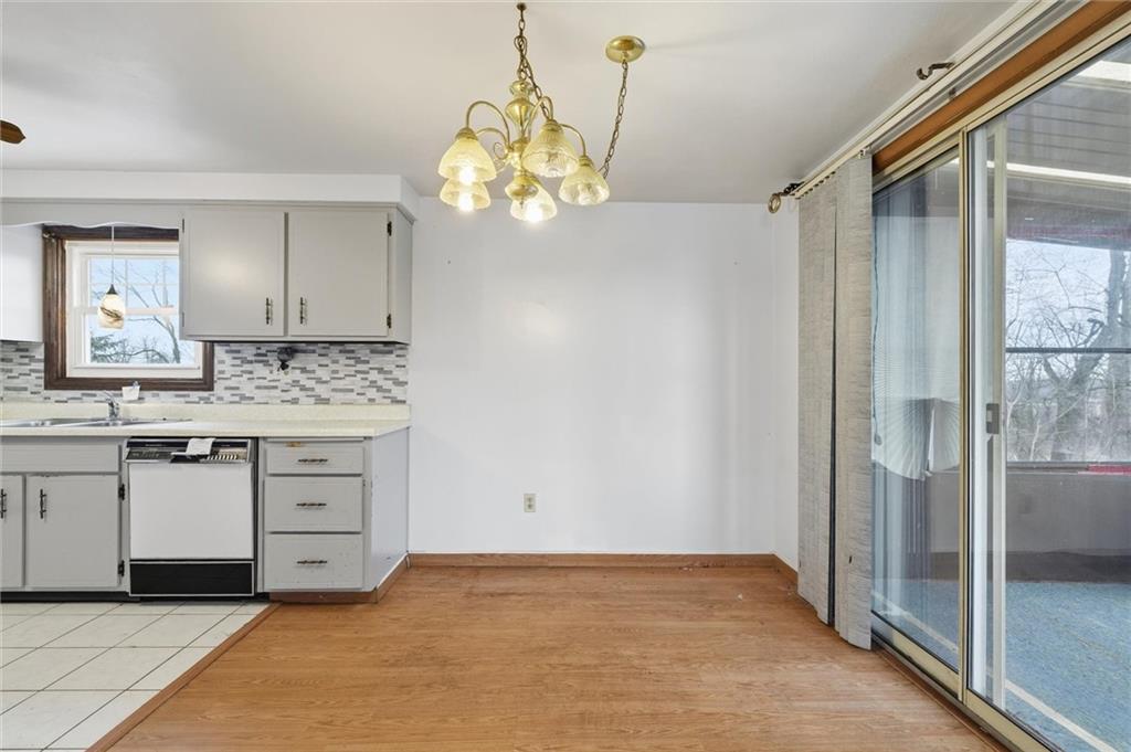 51 Revo Road Pittsburgh, PA 15236 - Photo 5 of 29 a view of kitchen with granite countertop cabinets and window