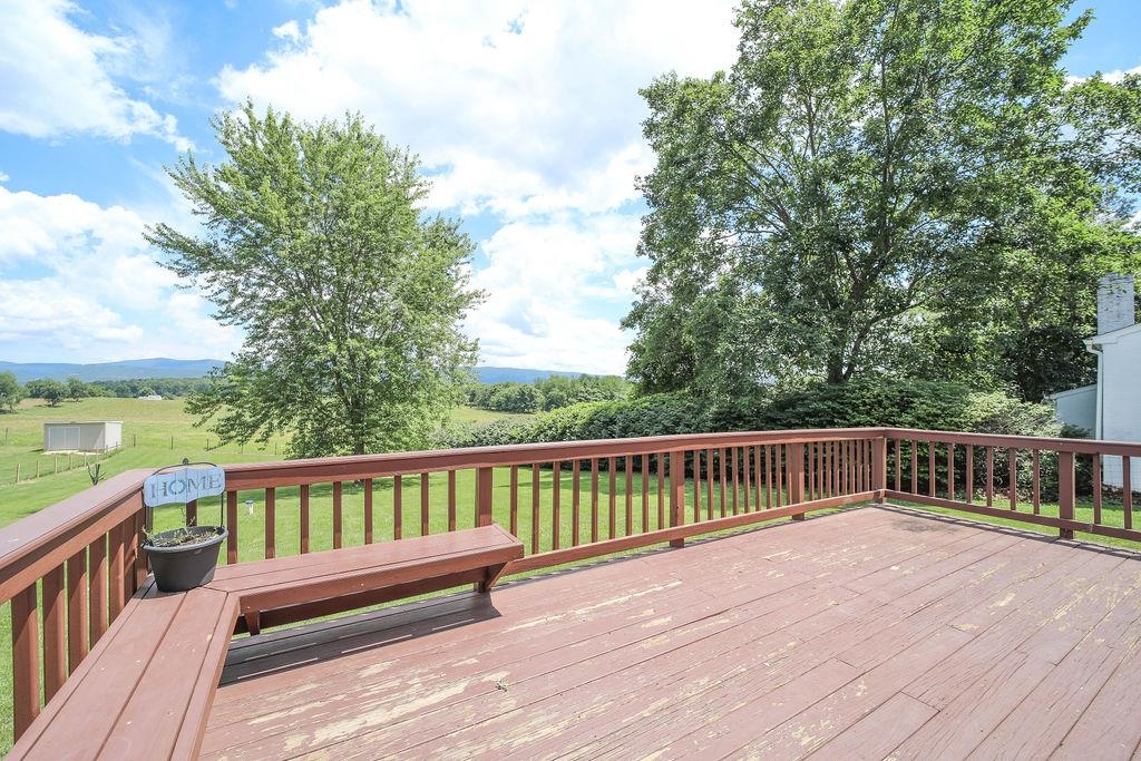 79 Cattle Scales Road Waynesboro, VA 22980 - Photo 11 of 39 a view of a wooden deck with a yard
