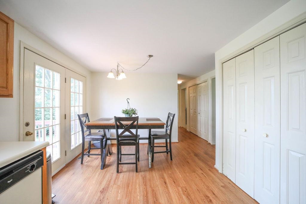 79 Cattle Scales Road Waynesboro, VA 22980 - Photo 15 of 39 a view of a dining room with furniture and wooden floor