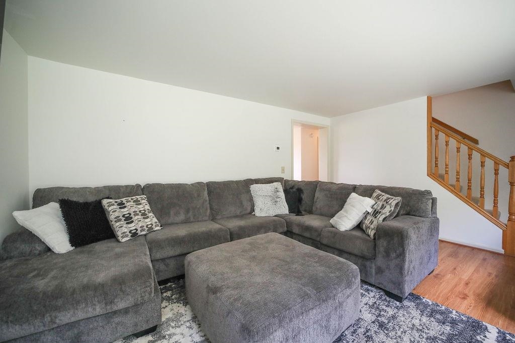 79 Cattle Scales Road Waynesboro, VA 22980 - Photo 18 of 39 a living room with furniture and wooden floor