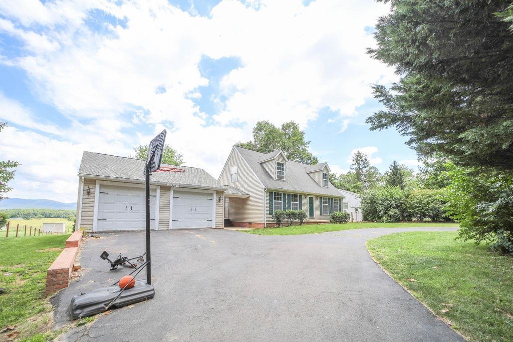 79 Cattle Scales Road Waynesboro, VA 22980 - Photo 5 of 39 a house view with a garden space
