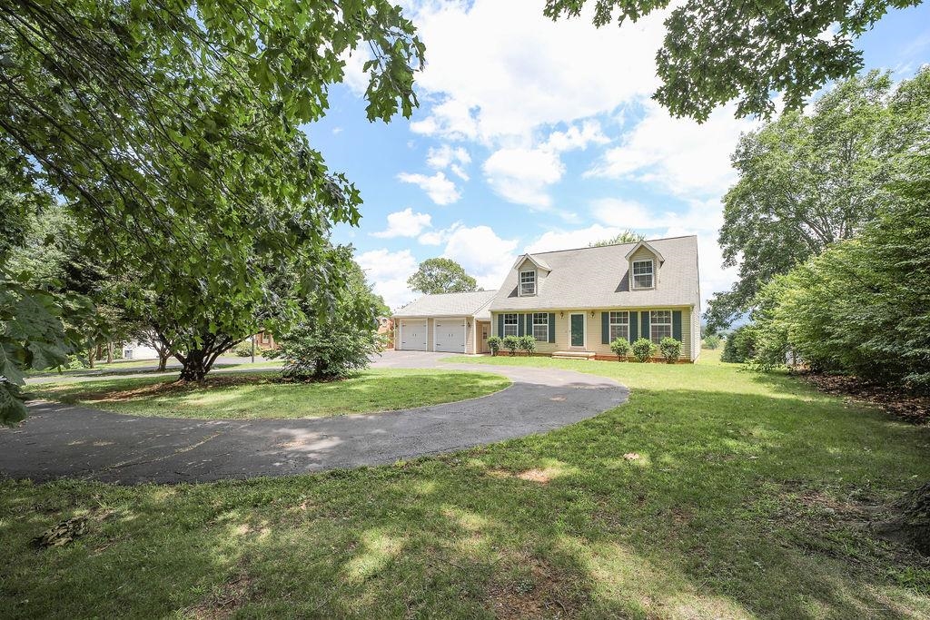 79 Cattle Scales Road Waynesboro, VA 22980 - Photo 7 of 39 a view of a house with yard and sitting area