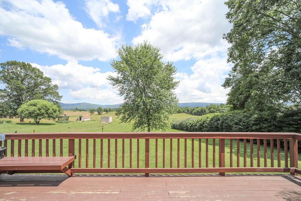 79 Cattle Scales Road Waynesboro, VA 22980 - Photo 10 of 39 a balcony with wooden floor and fence
