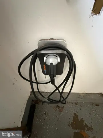 a view of staircase with utility room