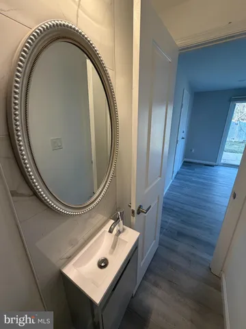 an entryway with wooden floor