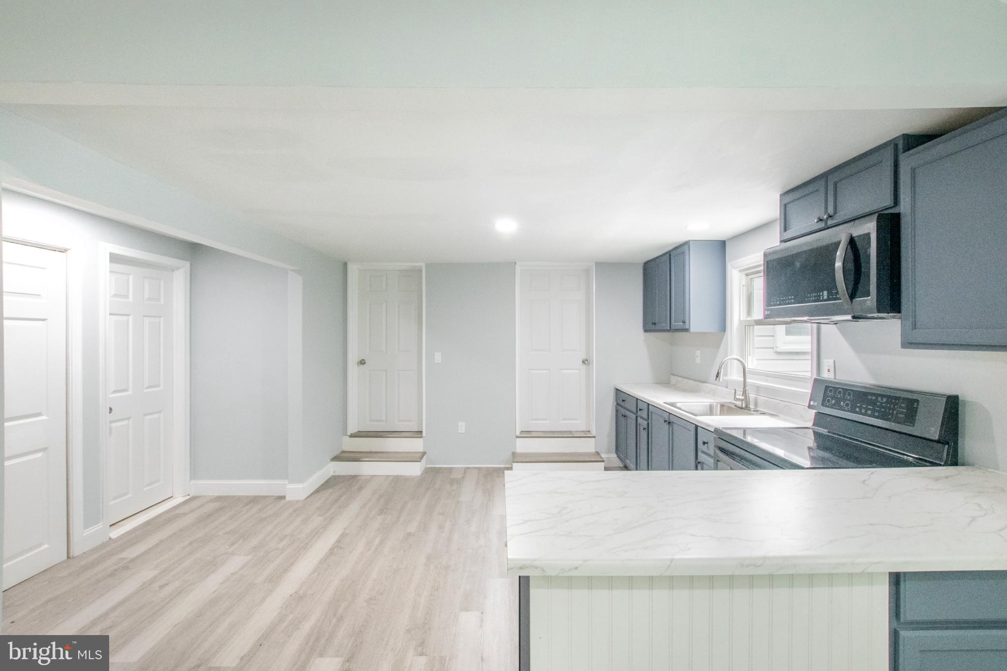 1425 South Manor Road Coatesville, PA 19320 - Photo 13 of 32 Modern kitchen with sleek finishes.
