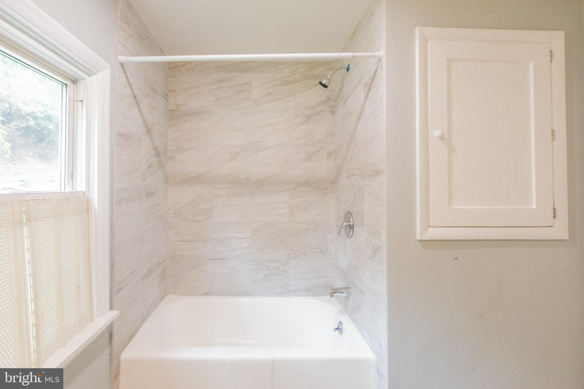 1425 South Manor Road Coatesville, PA 19320 - Photo 20 of 32 Serene bathroom retreat with natural light.