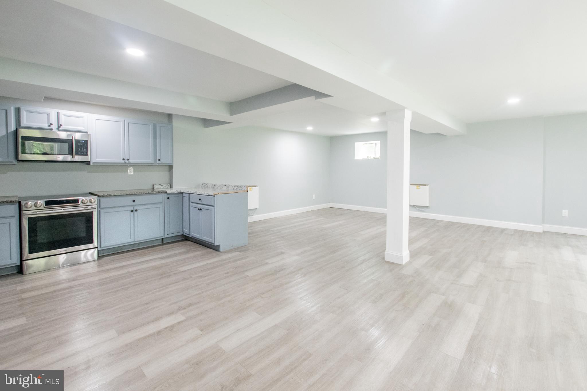 1425 South Manor Road Coatesville, PA 19320 - Photo 29 of 32 Spacious, modern basement with sleek finishes.