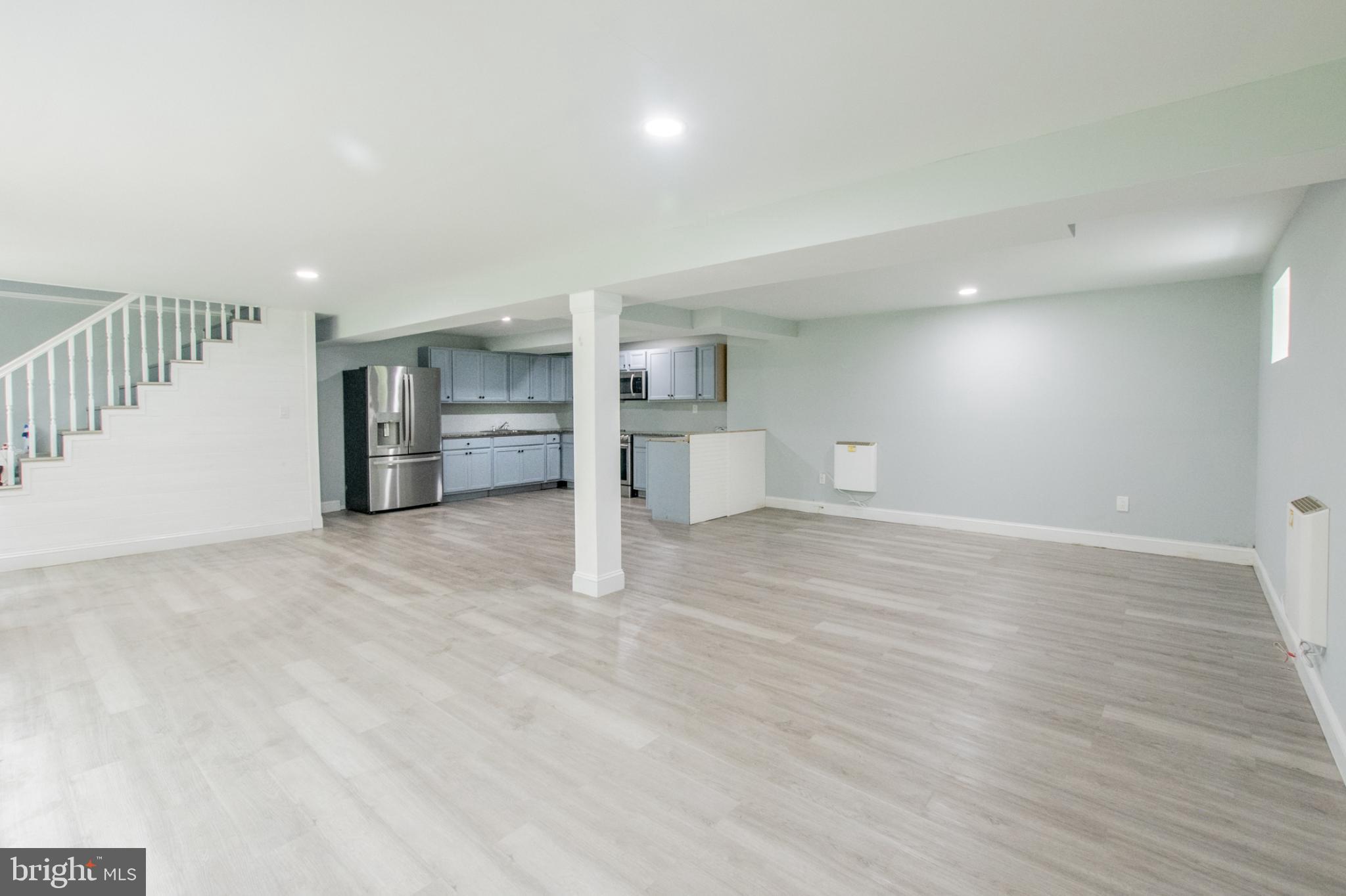 1425 South Manor Road Coatesville, PA 19320 - Photo 32 of 32 Spacious, modern basement with light hues.