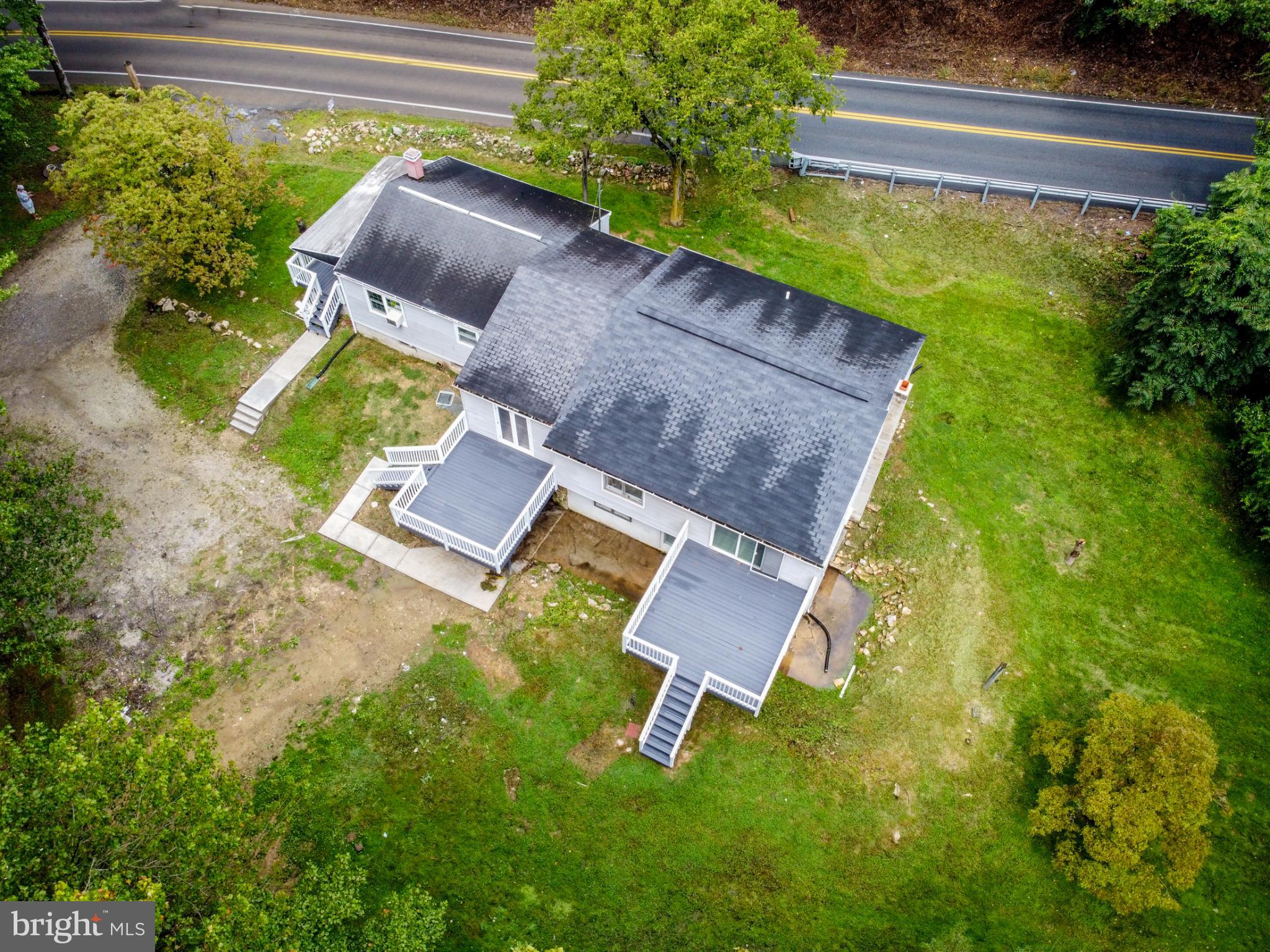 1425 South Manor Road Coatesville, PA 19320 - Photo 4 of 32 Charming home nestled in lush greenery.