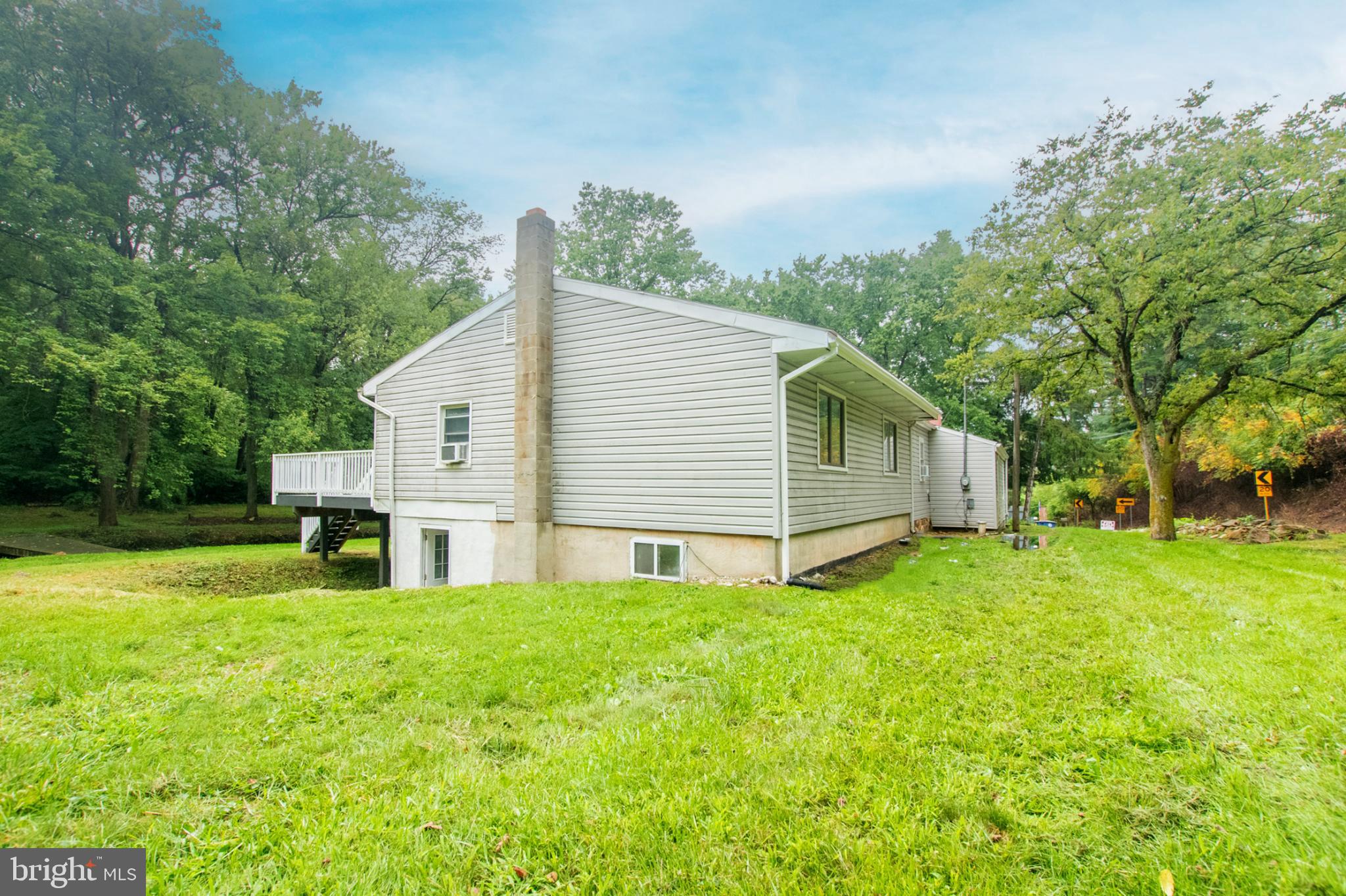 1425 South Manor Road Coatesville, PA 19320 - Photo 6 of 32 Charming home nestled in lush greenery.