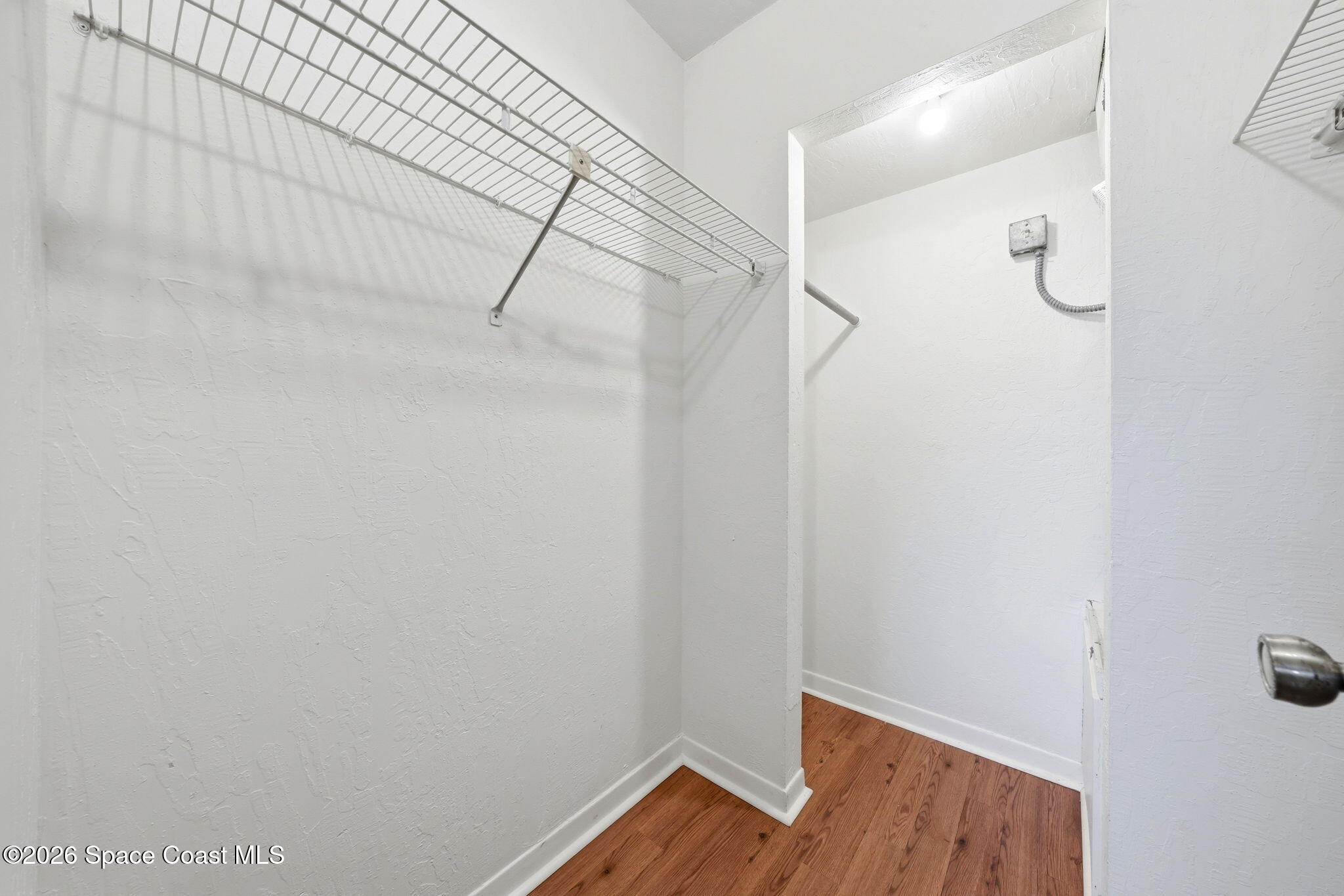 1702 University Lane, Unit 804 Cocoa, FL 32922 - Photo 20 of 25 a view of small space with racks on the wall