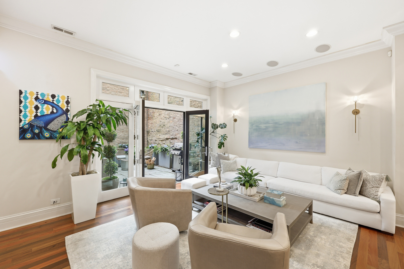 22 East Division Street, Unit 1 Chicago, IL 60610 - Photo 15 of 60 a living room with furniture and a potted plant