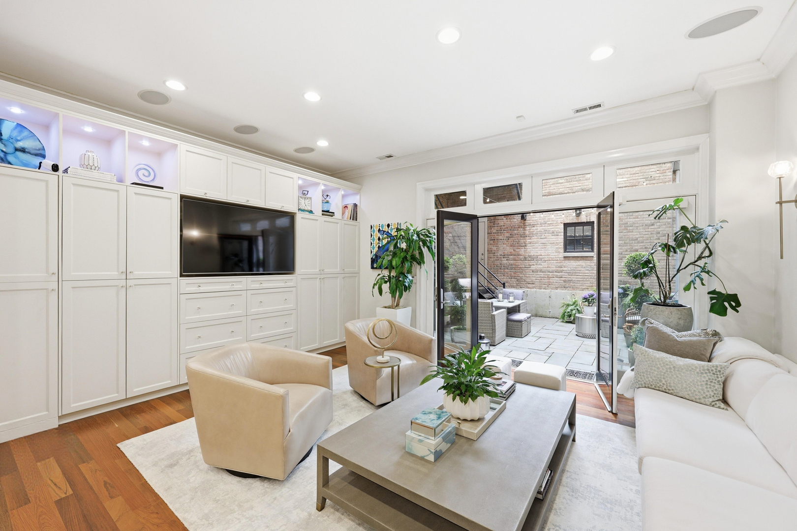 22 East Division Street, Unit 1 Chicago, IL 60610 - Photo 16 of 60 a living room with furniture and a flat screen tv