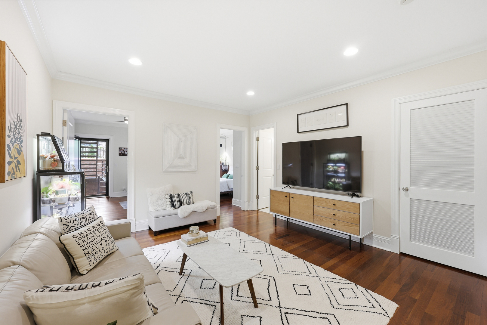 22 East Division Street, Unit 1 Chicago, IL 60610 - Photo 20 of 60 a living room with furniture and a flat screen tv
