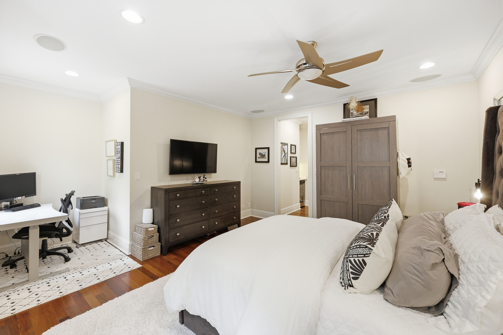 22 East Division Street, Unit 1 Chicago, IL 60610 - Photo 24 of 60 a bedroom with a bed and a flat screen tv