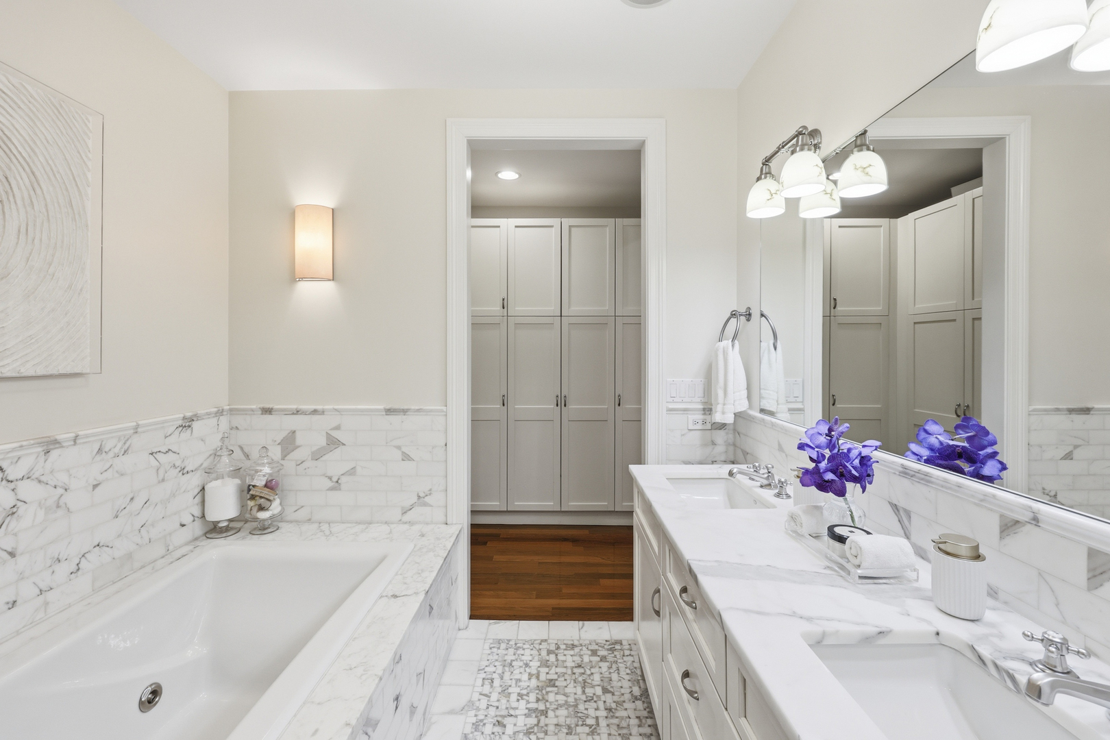 22 East Division Street, Unit 1 Chicago, IL 60610 - Photo 26 of 60 a bathroom with a tub sink and mirror
