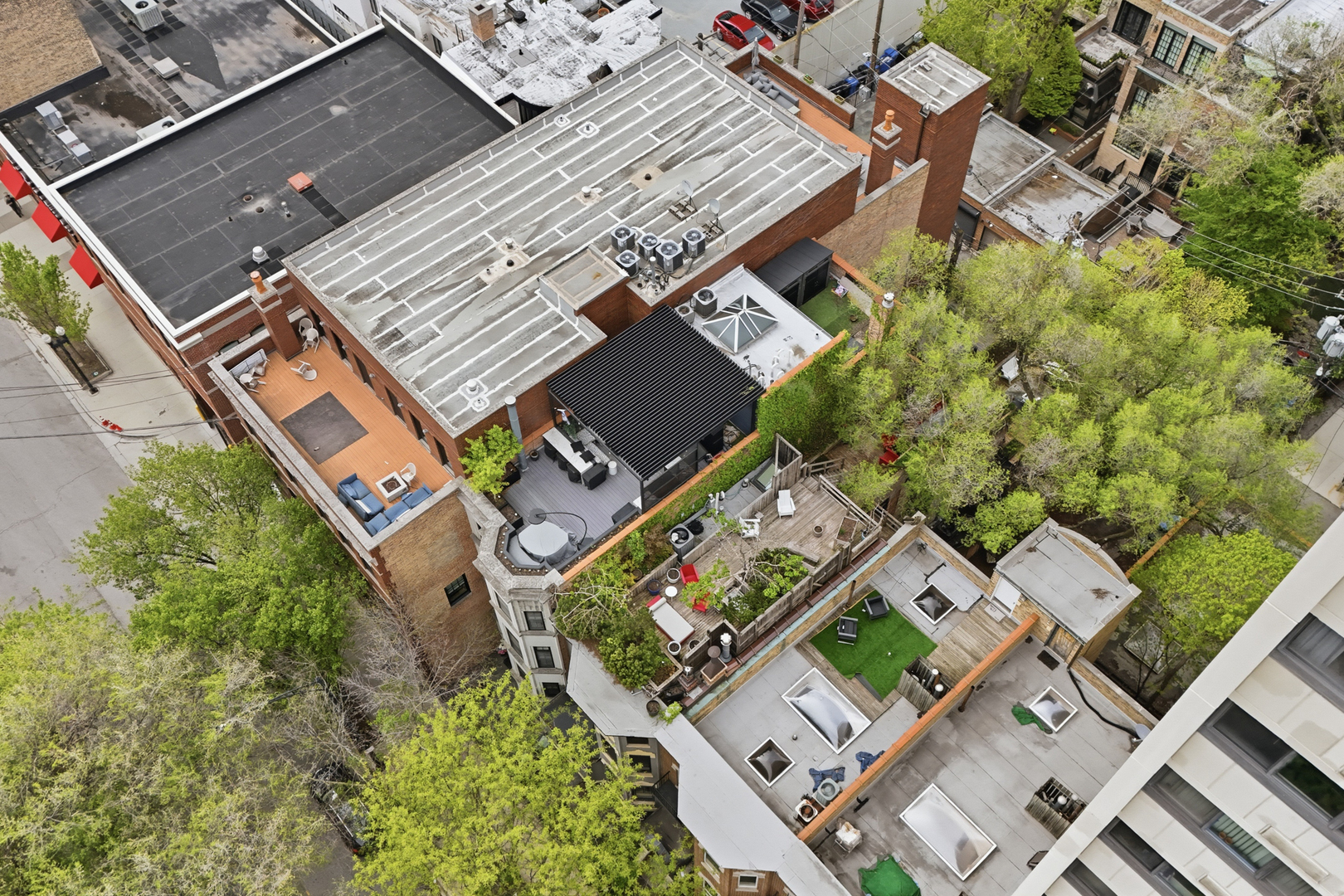22 East Division Street, Unit 1 Chicago, IL 60610 - Photo 55 of 60 an aerial view of a house with a yard