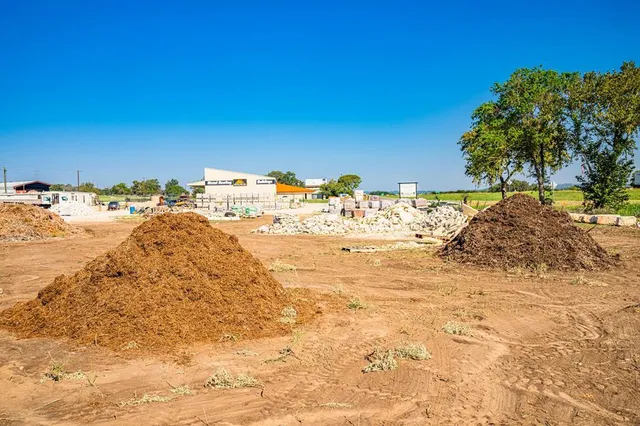 a view of swimming pool with outdoor seating and lake view