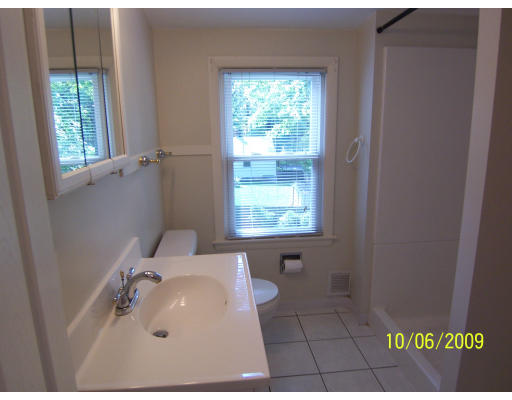 79 Hadley Street Springfield, MA 01118 - Photo 12 of 19 a bathroom with a sink and a window
