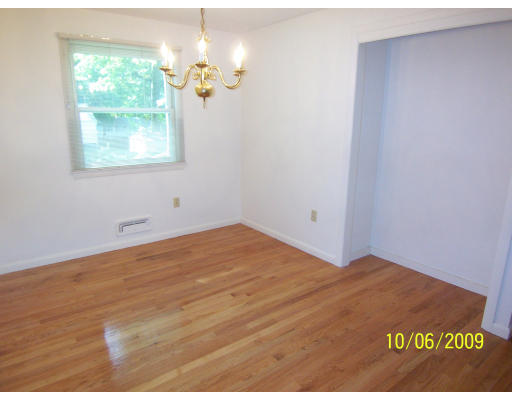 79 Hadley Street Springfield, MA 01118 - Photo 5 of 19 a view of empty room with window