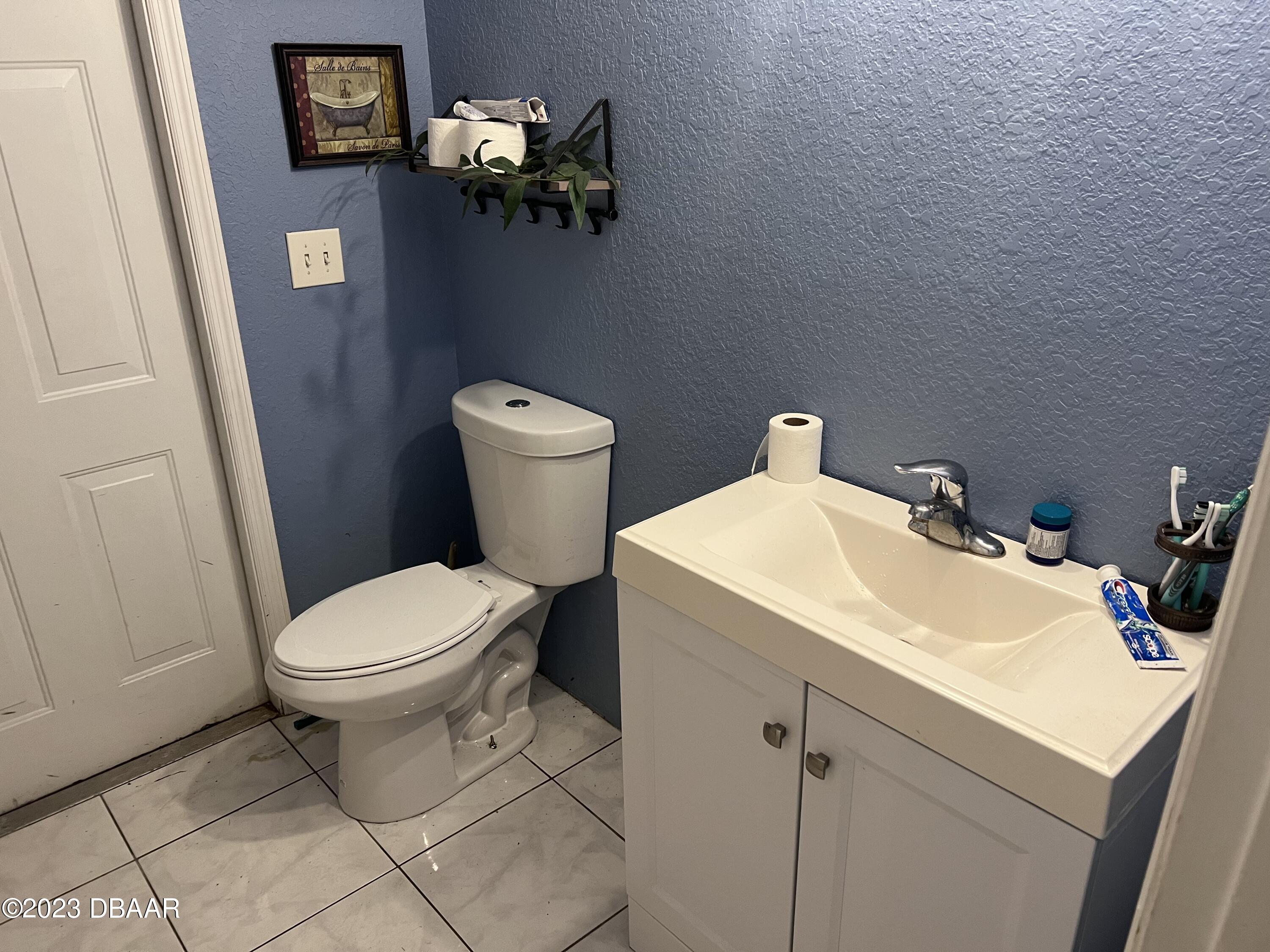 3315 Juniper Drive Edgewater, FL 32141 - Photo 15 of 20 a bathroom with a sink and a toilet