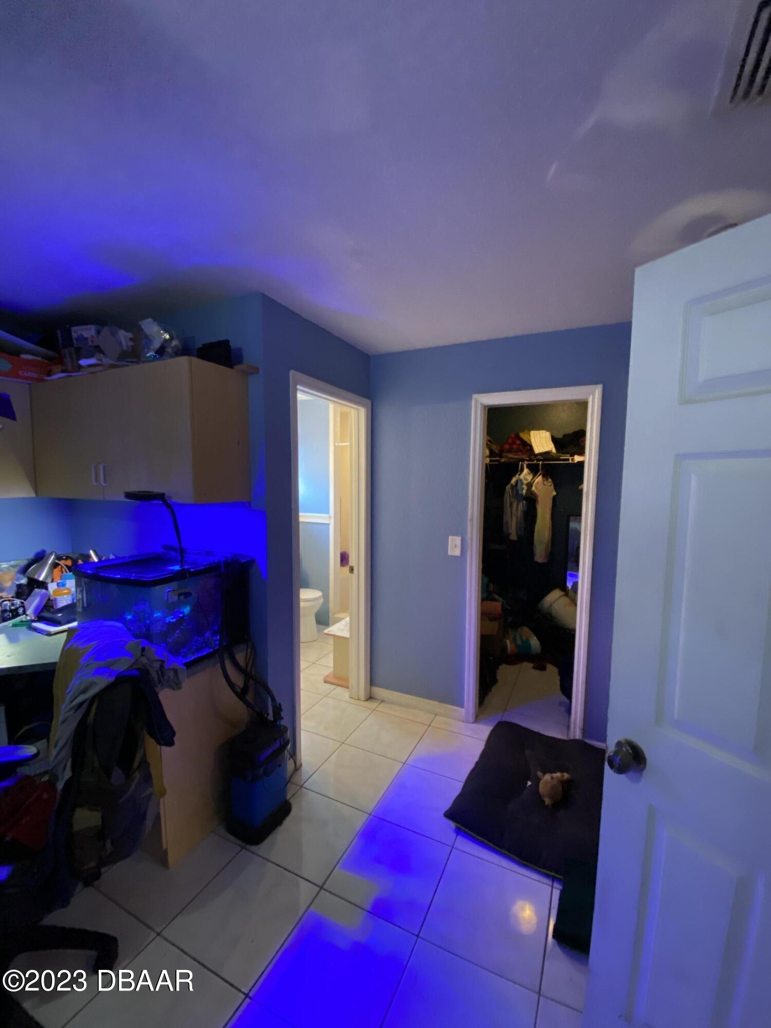 3315 Juniper Drive Edgewater, FL 32141 - Photo 17 of 20 a bedroom with a bed and a closet