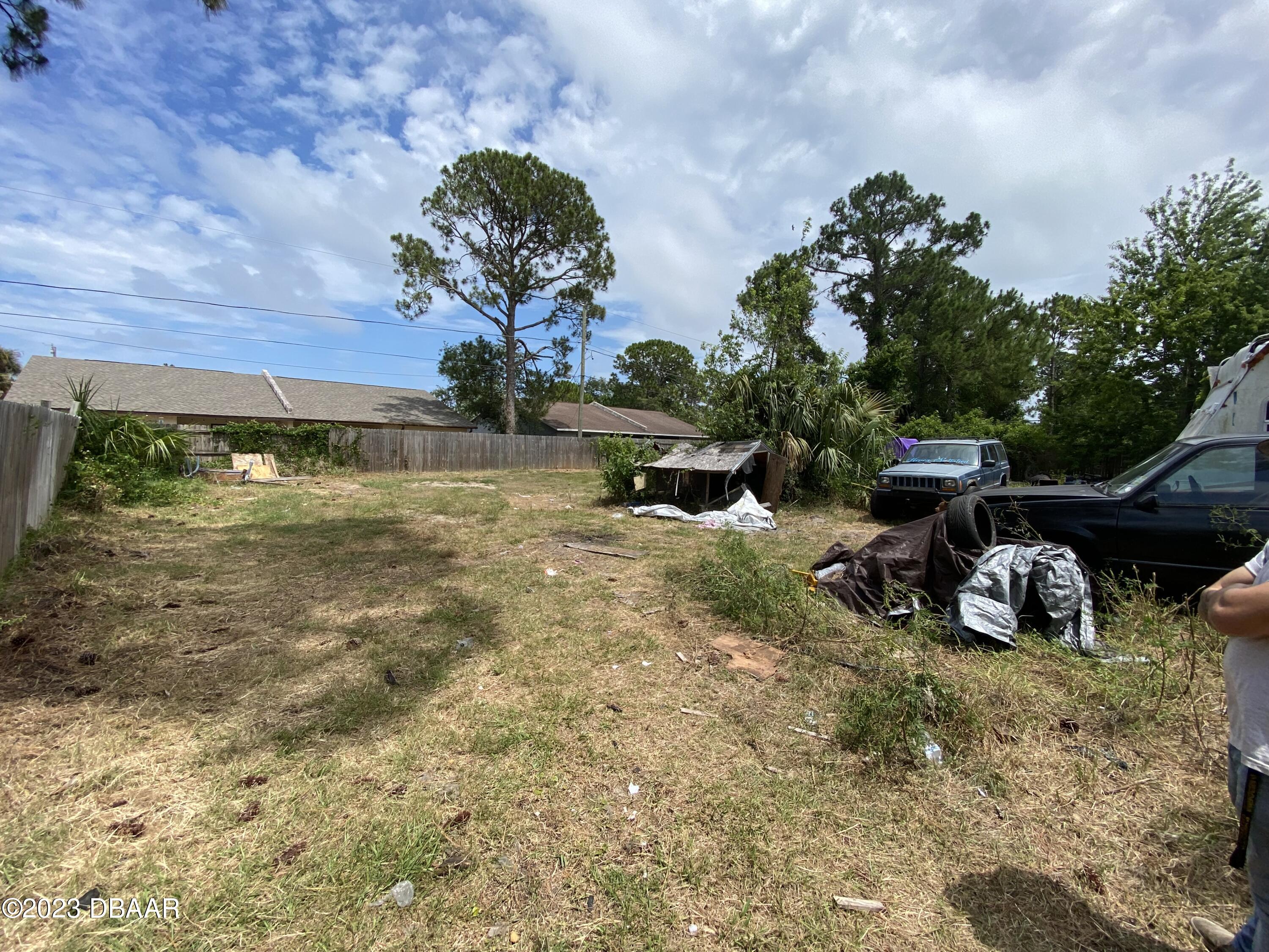3315 Juniper Drive Edgewater, FL 32141 - Photo 20 of 20 a view of a backyard with table and chairs
