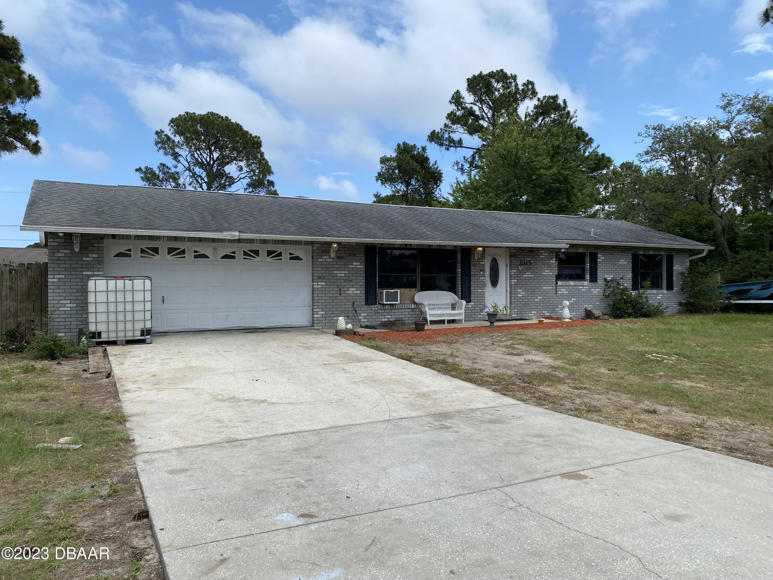 3315 Juniper Drive Edgewater, FL 32141 - Photo 3 of 20 a view of a house with a yard