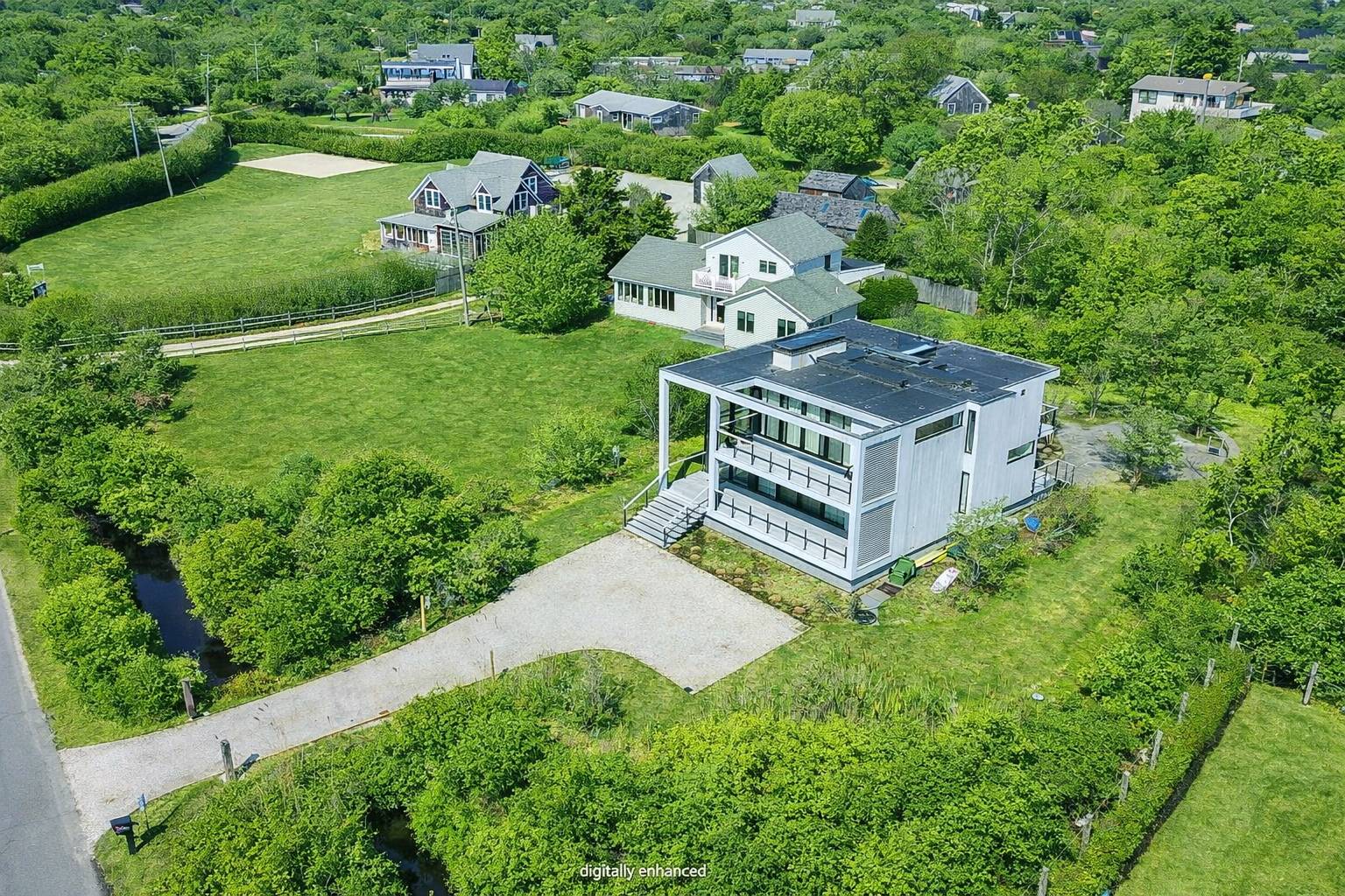 15 Deforest Road Montauk, NY 11954 - Photo 21 of 22 an aerial view of a house with a garden
