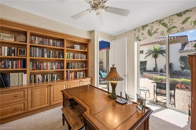 a view of a workspace with furniture
