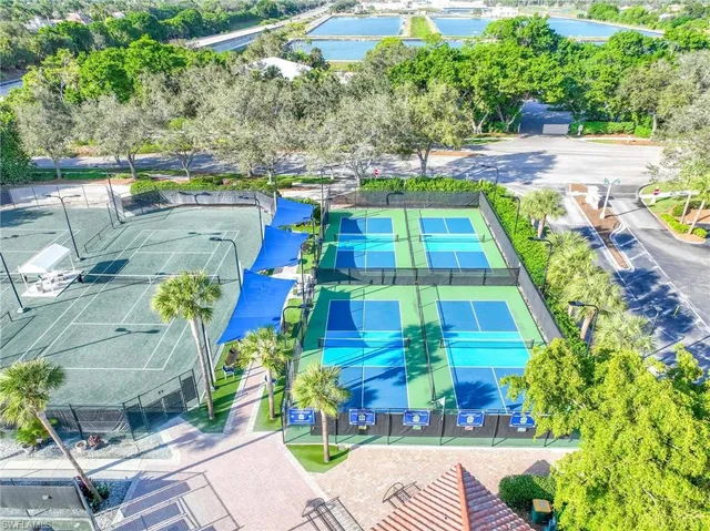 a view of swimming pool with sitting area