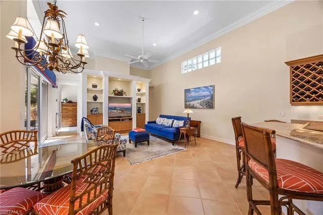 a view of a livingroom with furniture and chandelier