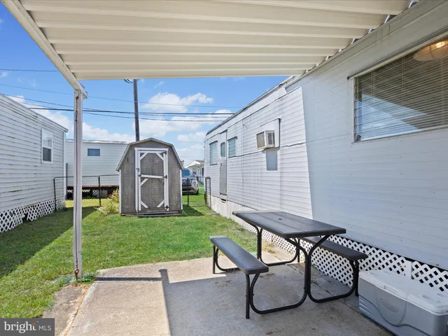 a view of a porch with furniture