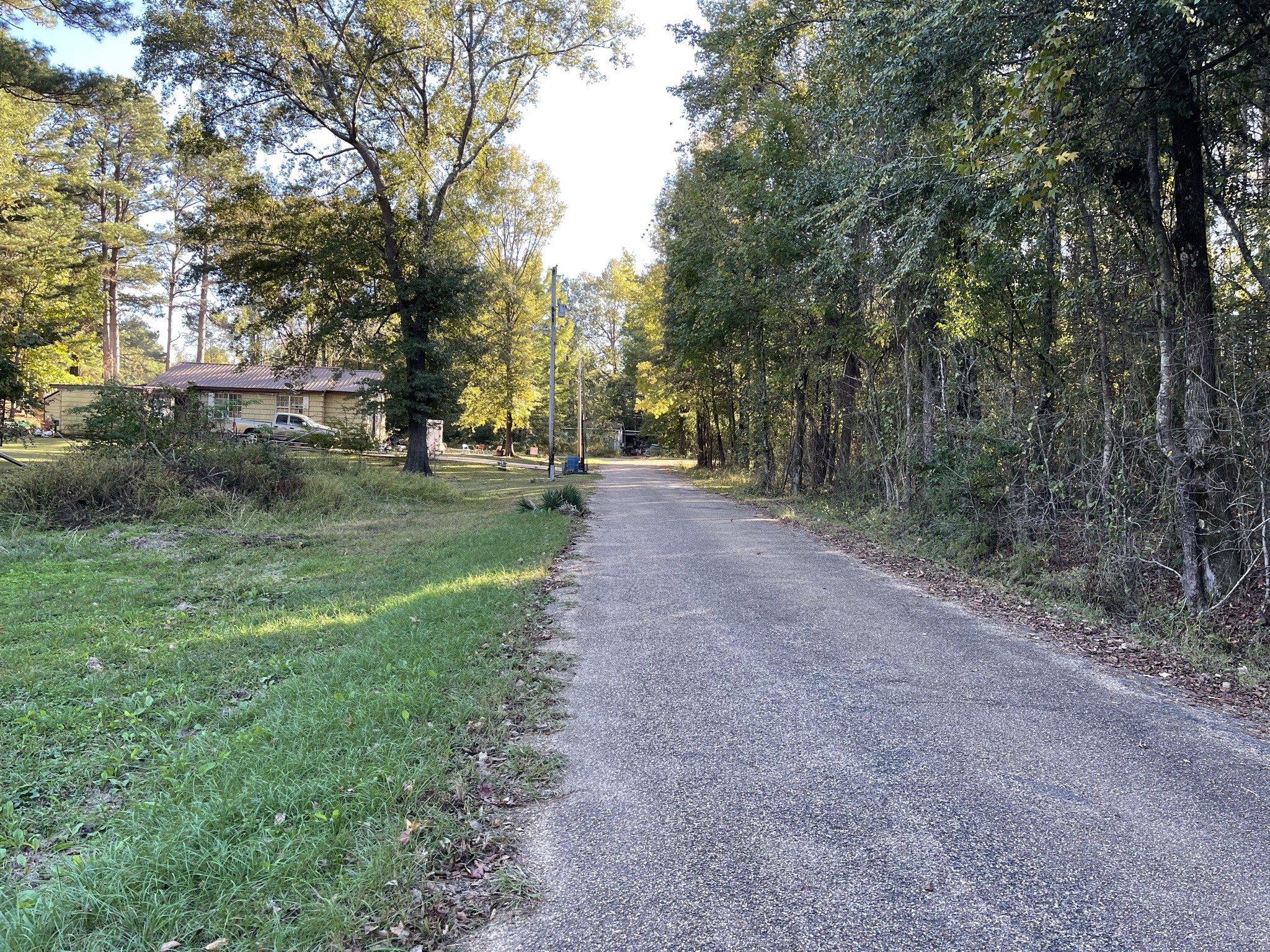 0 Sunset Street Other, AR 71701 - Photo 3 of 4 a view of a field with trees in front of it