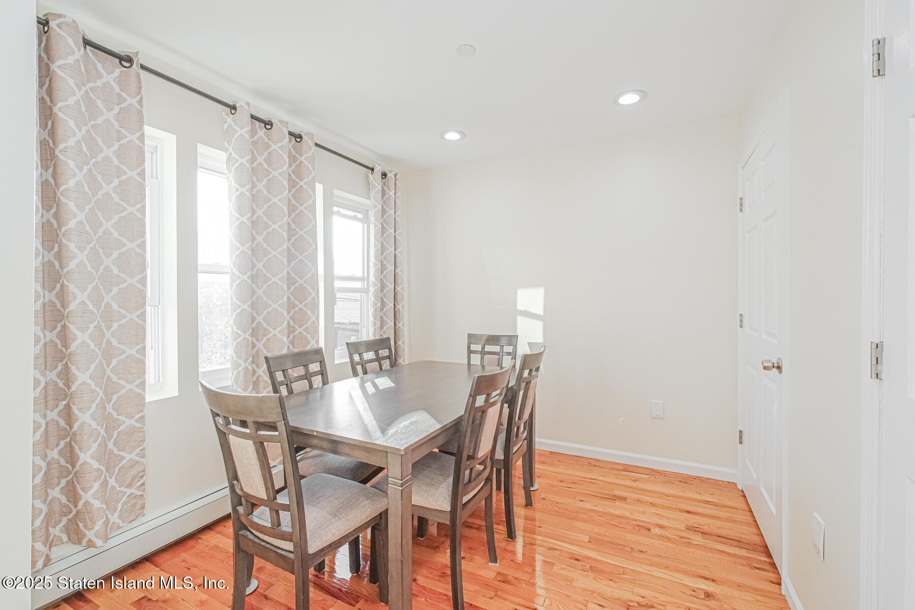 43 Maple Terrace Staten Island, NY 10306 - Photo 15 of 32 a view of a dining room with furniture and wooden floor