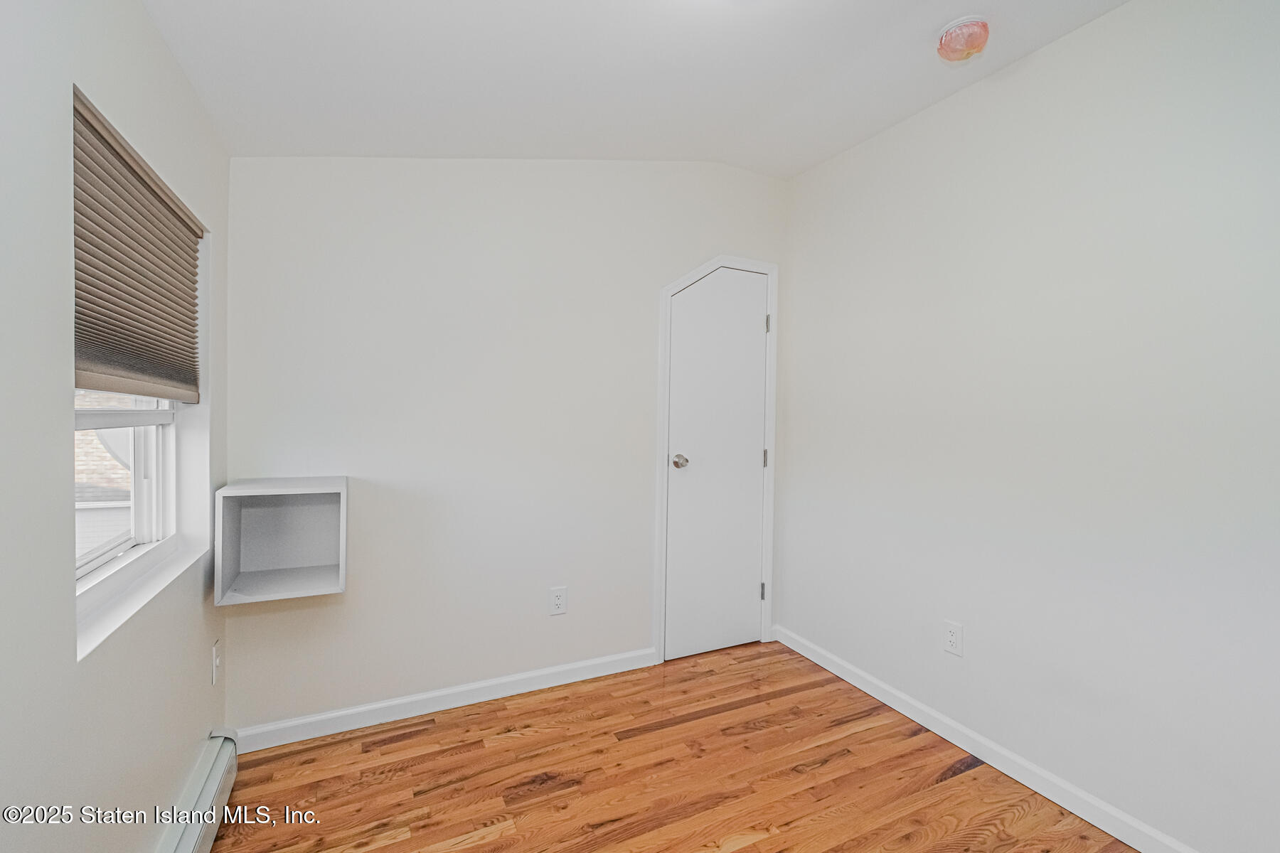 43 Maple Terrace Staten Island, NY 10306 - Photo 23 of 32 a view of empty room with wooden floor