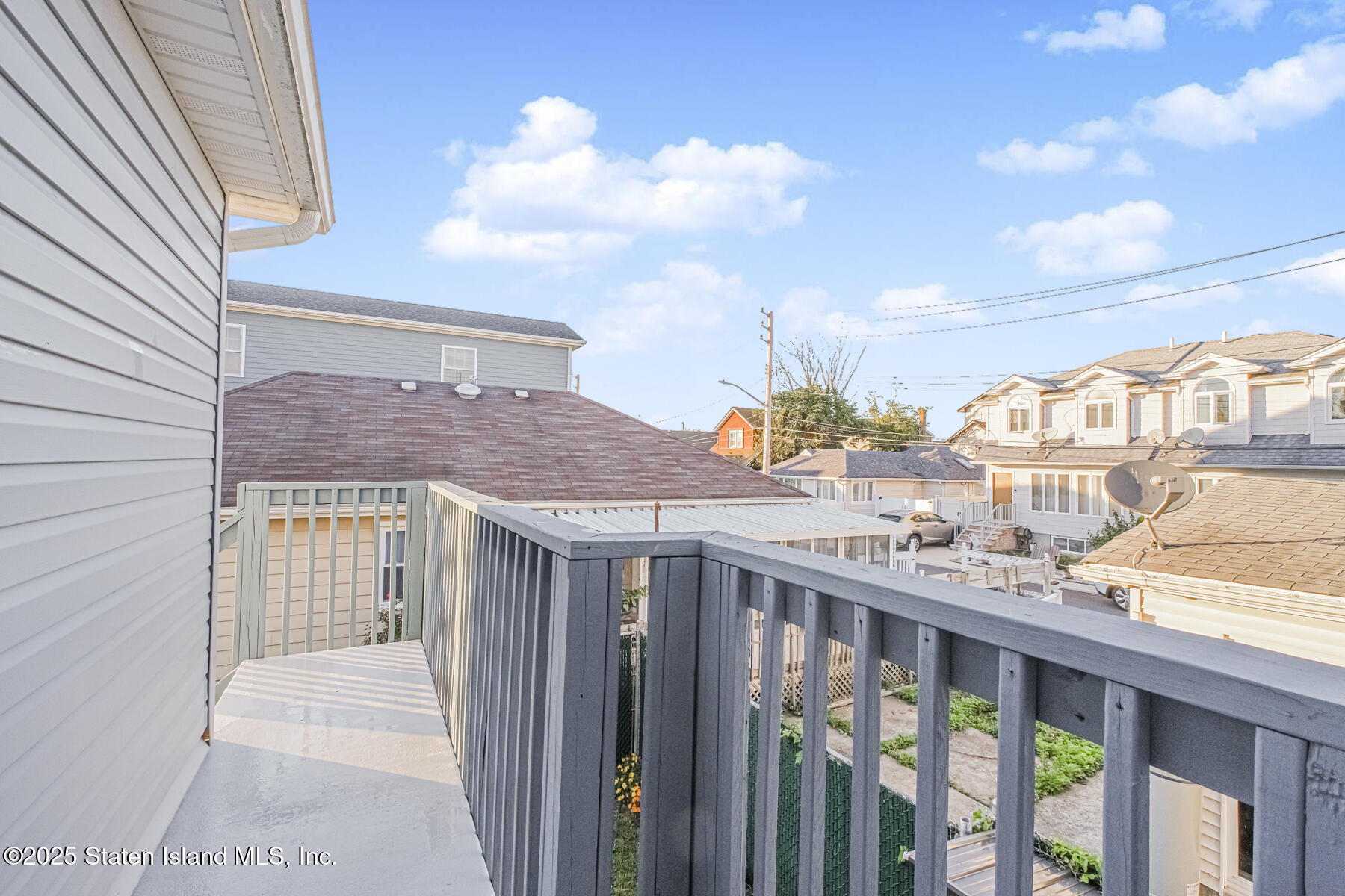 43 Maple Terrace Staten Island, NY 10306 - Photo 25 of 32 a front view of a house with a garden