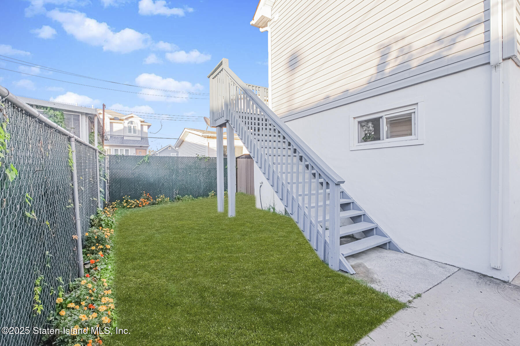 43 Maple Terrace Staten Island, NY 10306 - Photo 28 of 32 a view of a house with a yard