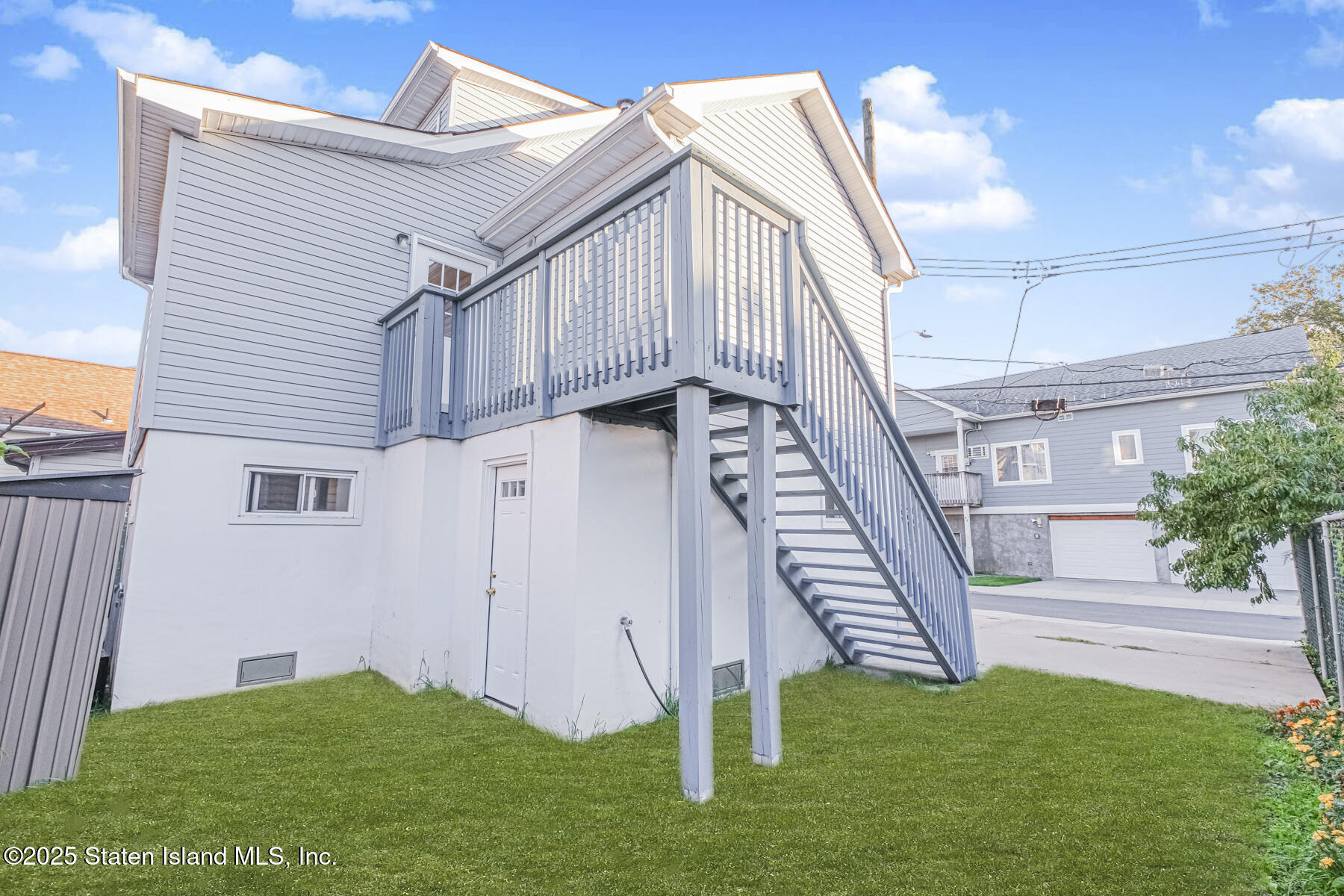 43 Maple Terrace Staten Island, NY 10306 - Photo 29 of 32 a view of a house with a yard