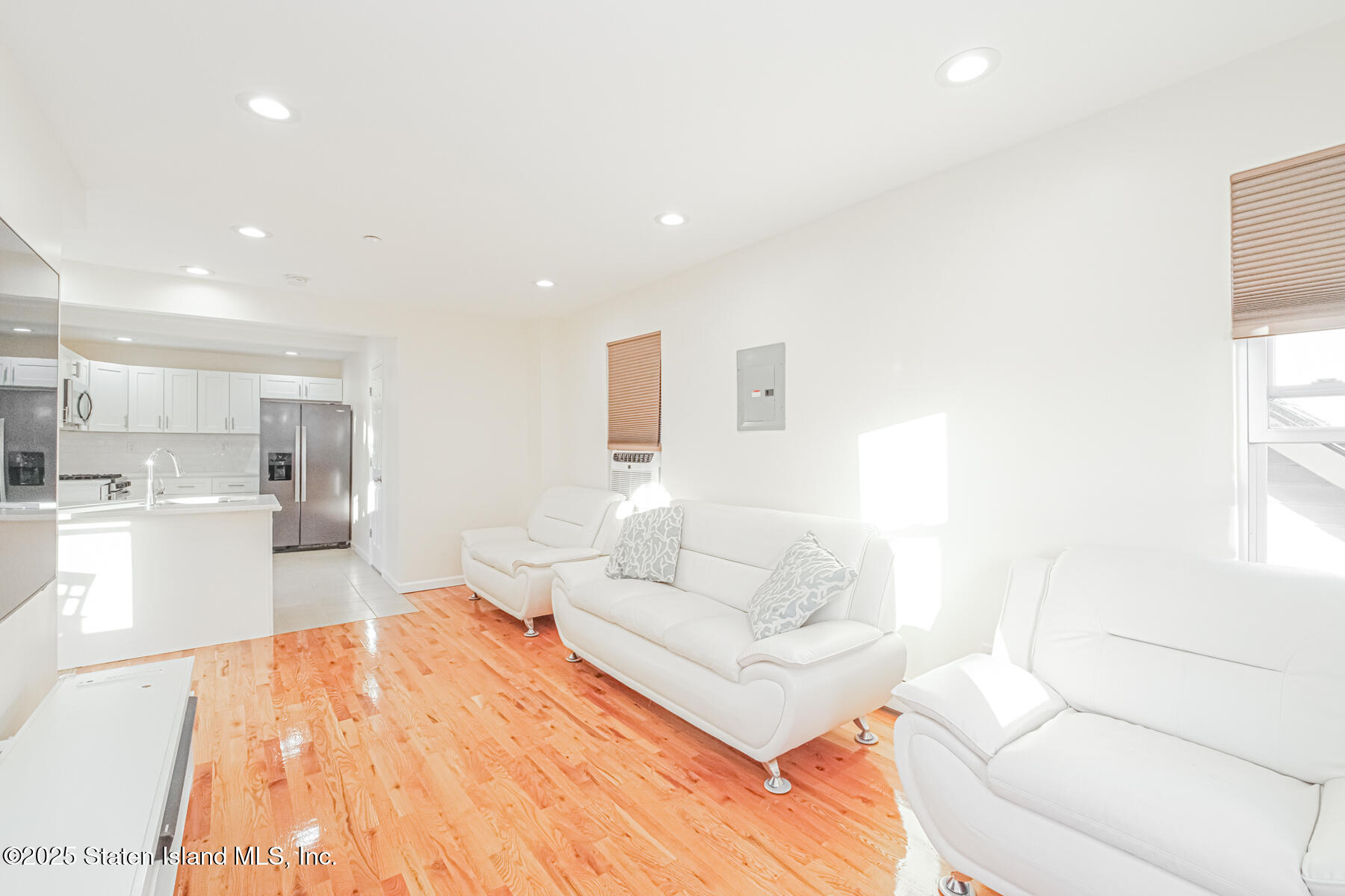 43 Maple Terrace Staten Island, NY 10306 - Photo 3 of 32 a living room with furniture and view of kitchen