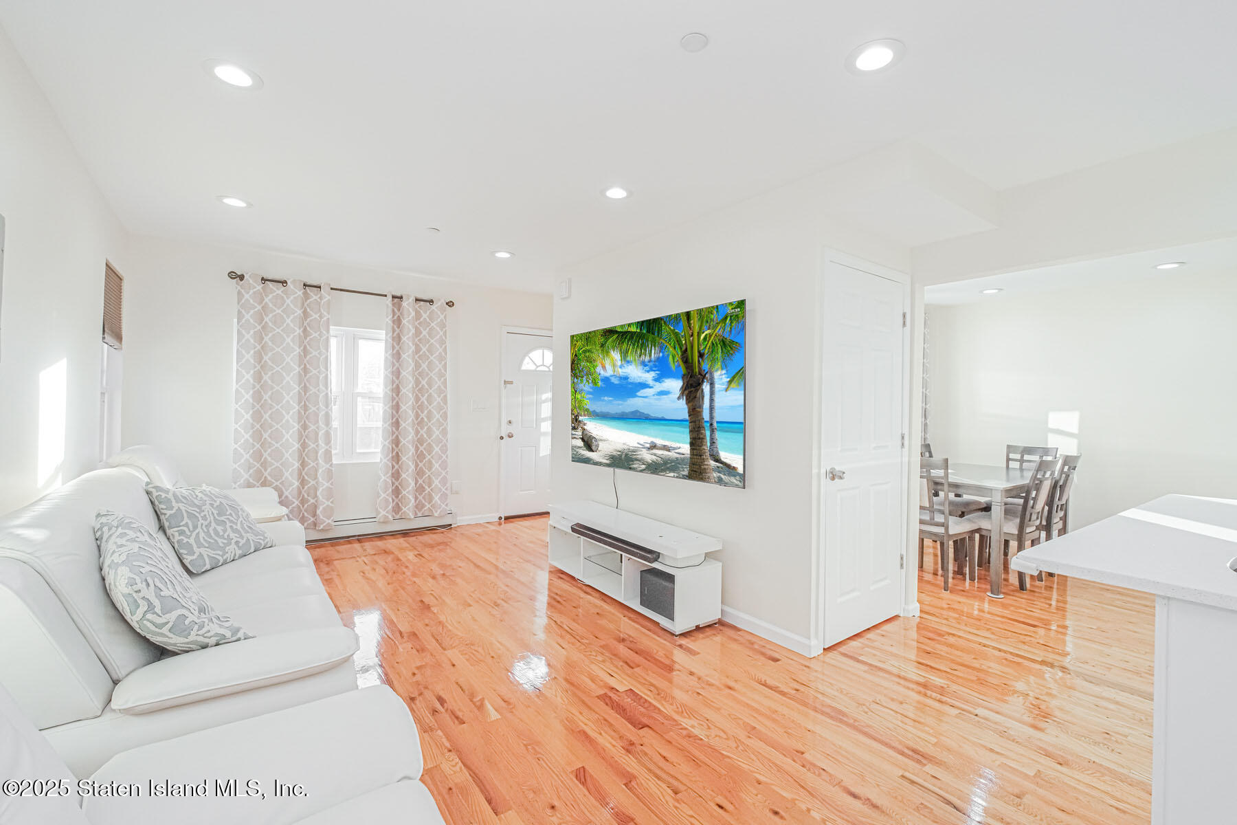 43 Maple Terrace Staten Island, NY 10306 - Photo 4 of 32 a living room with furniture and a flat screen tv