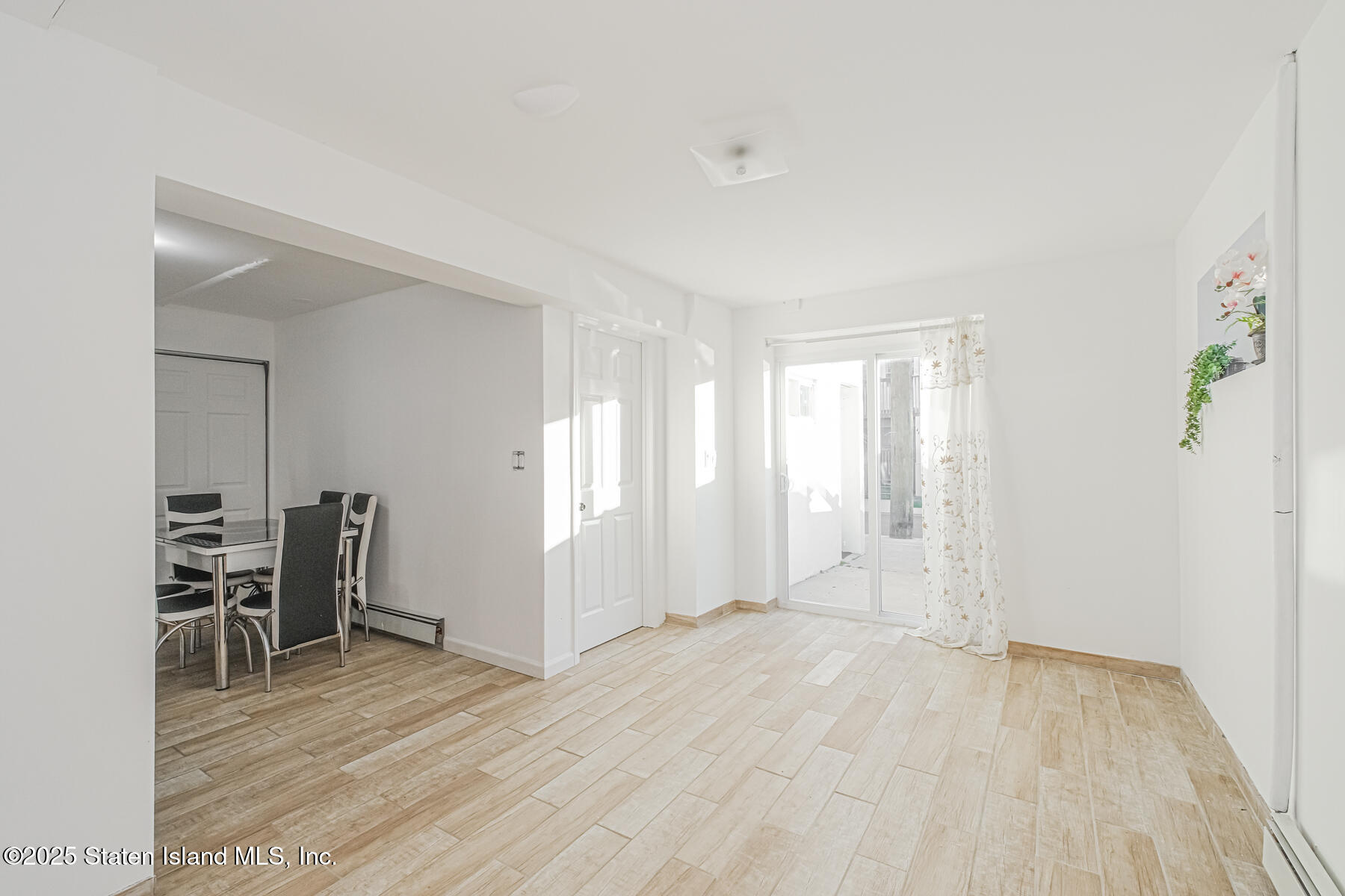 43 Maple Terrace Staten Island, NY 10306 - Photo 7 of 32 a view of empty room with wooden floor
