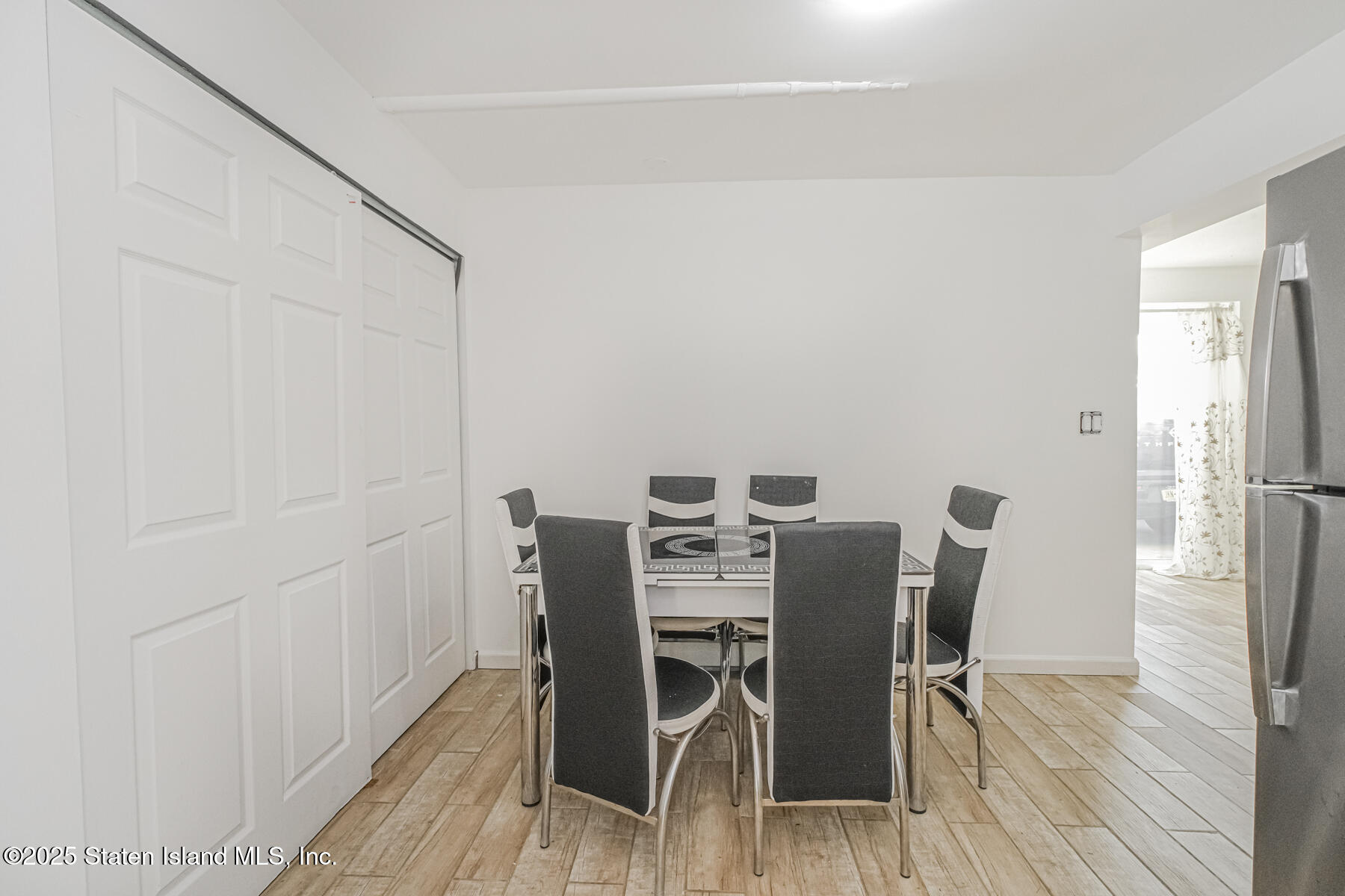 43 Maple Terrace Staten Island, NY 10306 - Photo 9 of 32 a view of a dining room with furniture and wooden floor