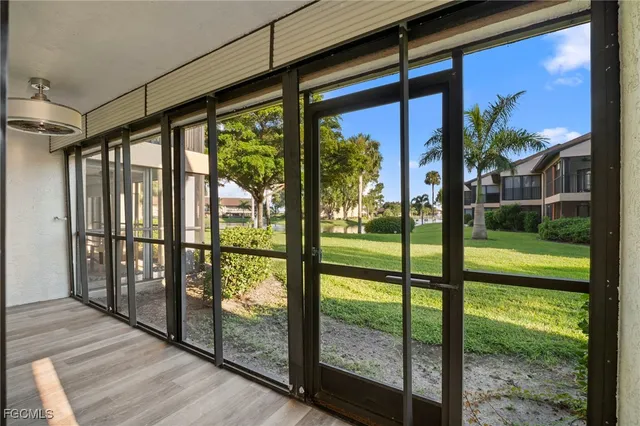 a view of a porch with a garden