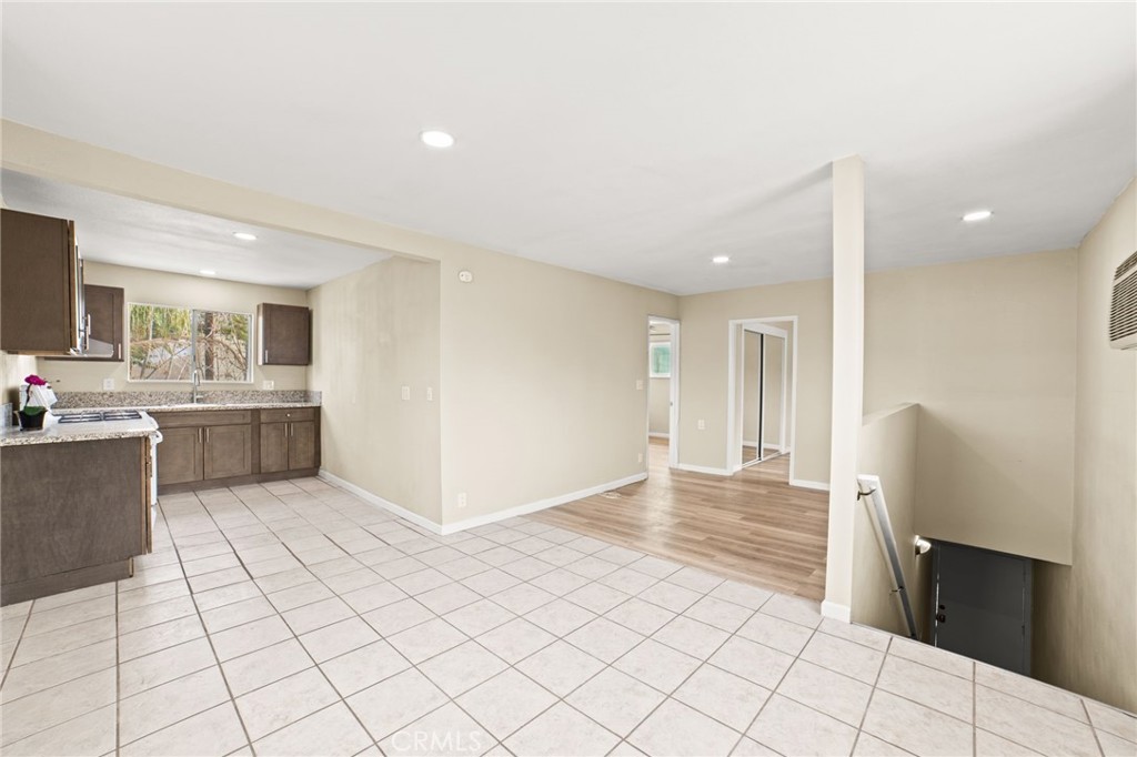 3717 Roosevelt Street Riverside, CA 92503 - Photo 15 of 23 a view of kitchen with granite countertop cabinets and refrigerator