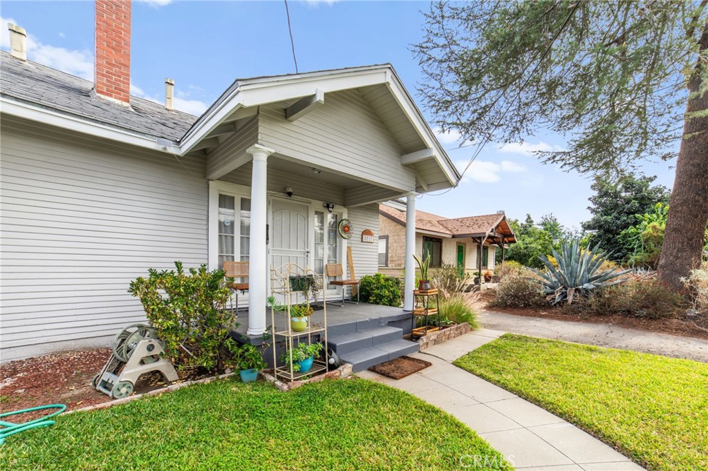 3717 Roosevelt Street Riverside, CA 92503 - Photo 5 of 23 a front view of a house with garden