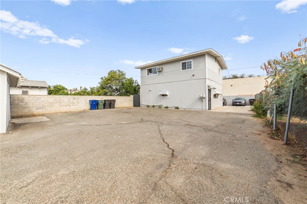 3717 Roosevelt Street Riverside, CA 92503 - Photo 8 of 23 a view of a house with a yard