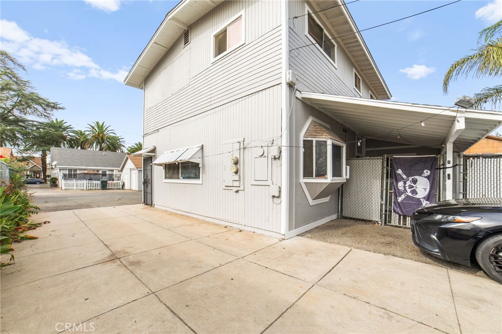 3717 Roosevelt Street Riverside, CA 92503 - Photo 9 of 23 a front view of a building with glass door and windows